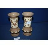 A pair of small Royal Doulton silicone Vases.