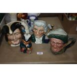 Three large Royal Doulton Toby Jugs, 'Captain Henri Morgan,' 'Auld Mac' etc.