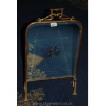 A Brass mirrored Firescreen.