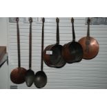 Two Copper Saucepans (one being lidded), ladle and draining spoon,