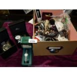 A box of miscellaneous costume jewellery and wristwatches