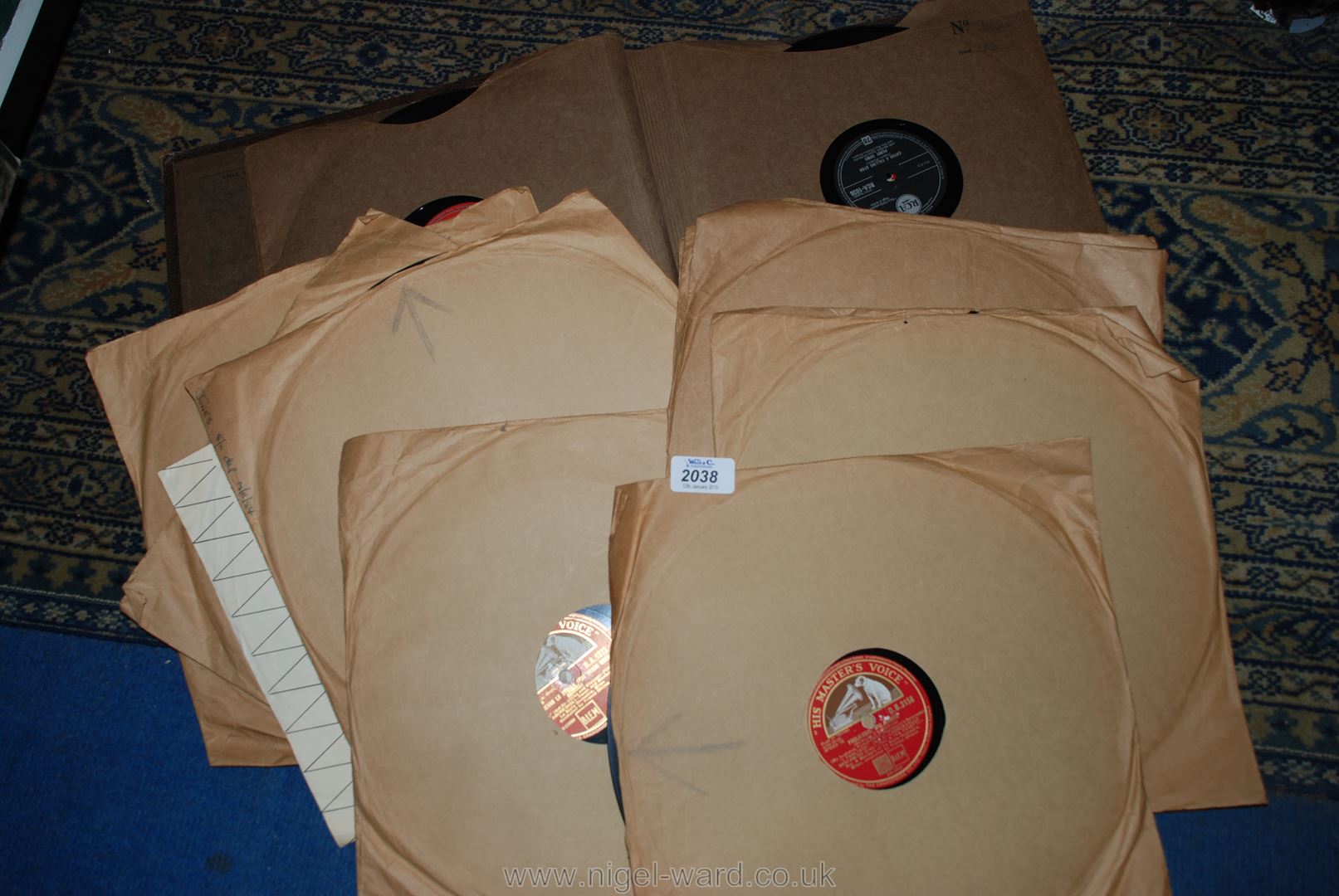 A quantity of 78 RPM records.