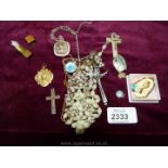 A Silver St. Christopher and chain, miscellaneous Rosary beads and religious momento's.