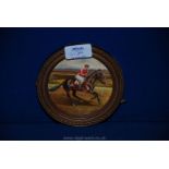 A small circular Oil painting "Horse and Jockey", signed.