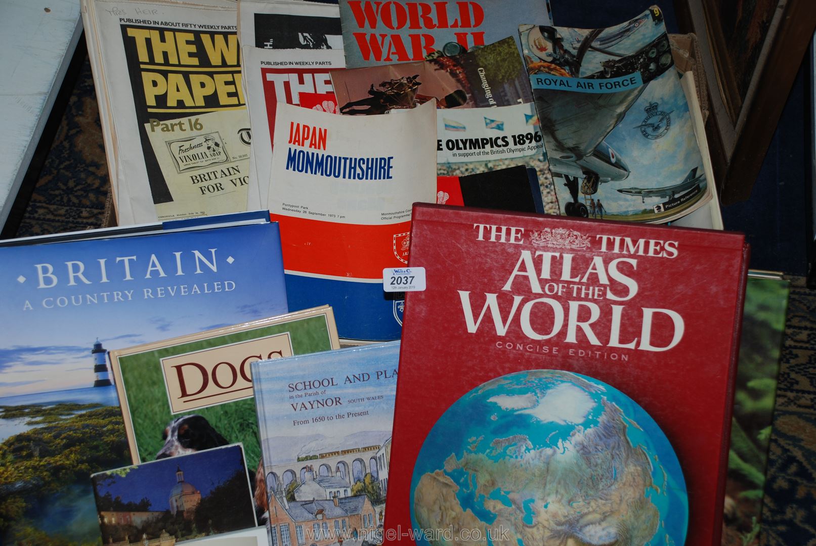 A quantity of The War papers in weekly parts, Rugby programmes, Atlas of the World, etc.