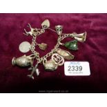 A Silver charm Bracelet with eleven charms