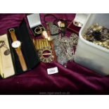 A box of miscellaneous costume jewellery including watches, necklaces,
