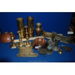 A quantity of brass including brass candlesticks, small brass fender,