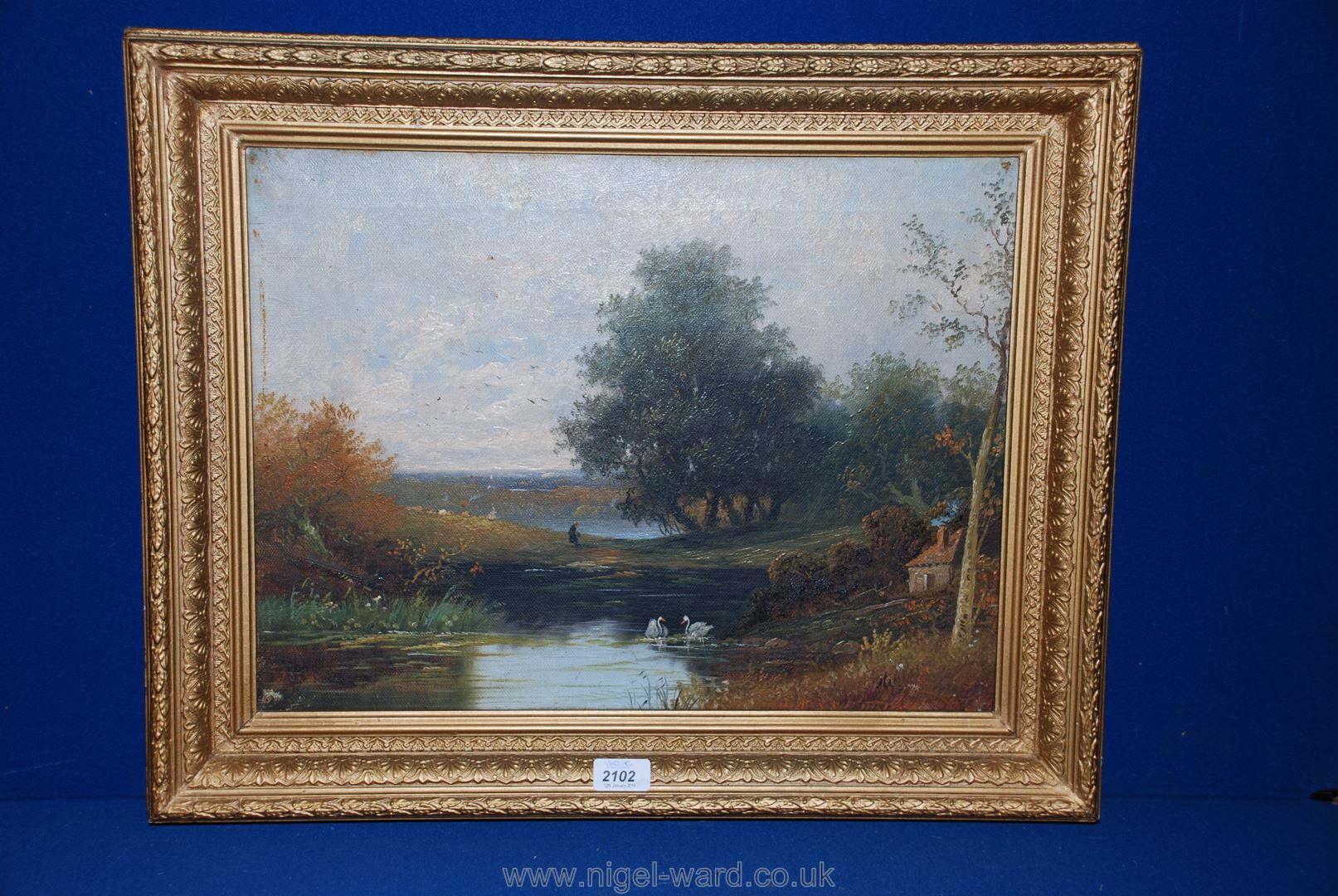 An Oil on canvas of a rural English landscape with a good gilt frame;