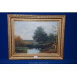 An Oil on canvas of a rural English landscape with a good gilt frame;