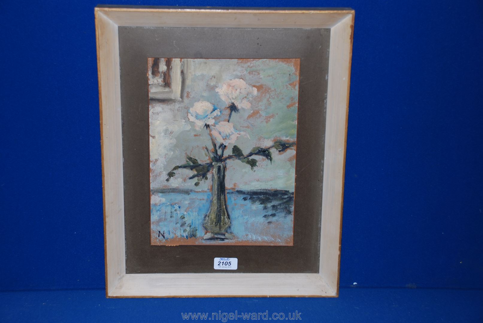 A still life Oil painting on card, signed 'N' bottom left, in the manner of William Nicholson.