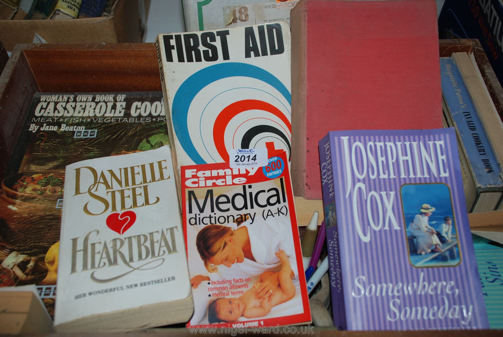 A quantity of books including; Cookery, First Aid and paperback novels.