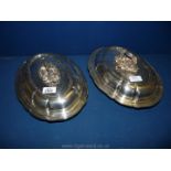 A pair of silver plated Tureens with oak leaf handles and "Stag" family crest to lids,