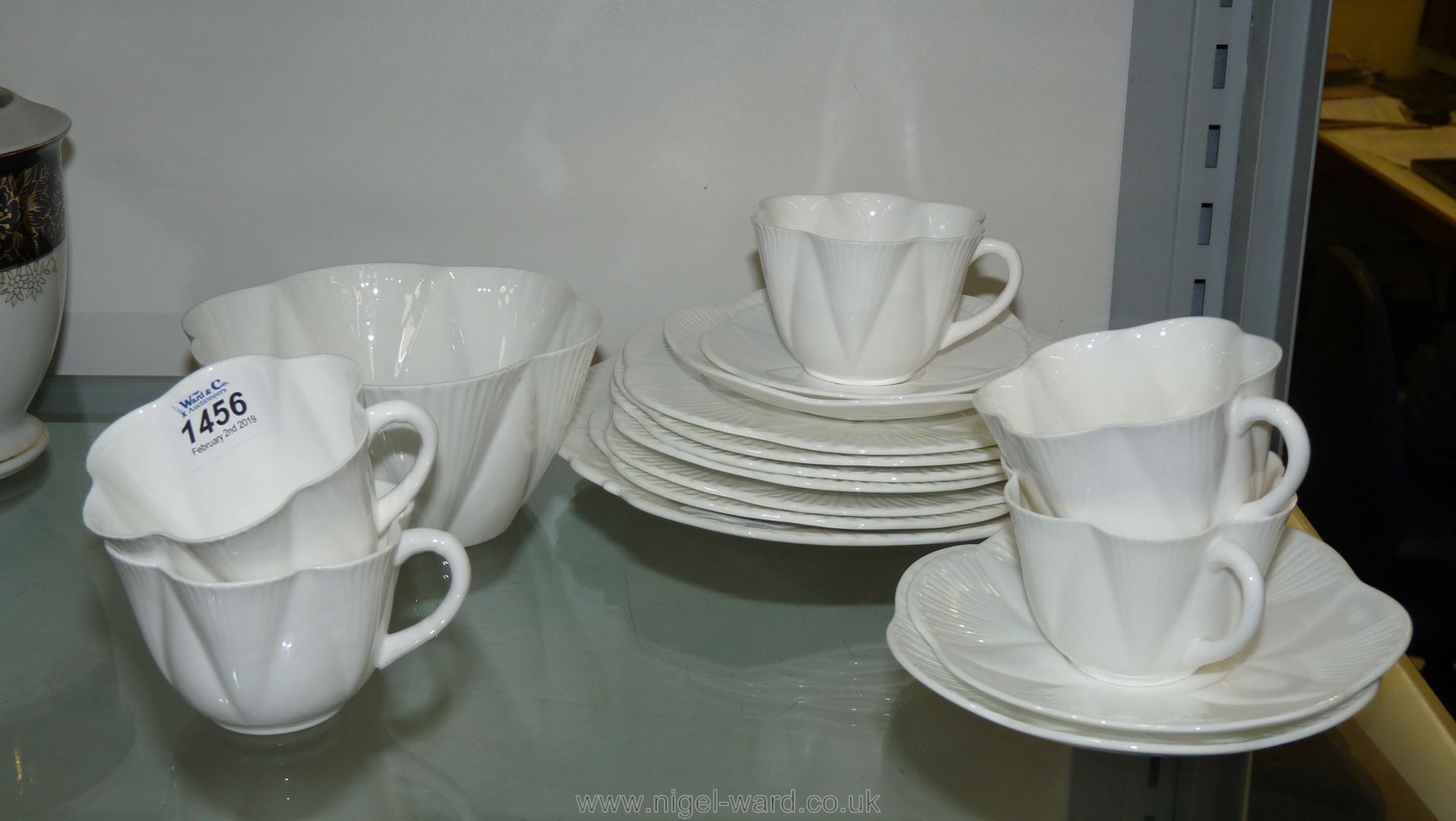 A part white Shelly Teaset, six plates, five cups three large saucers, one large saucers,