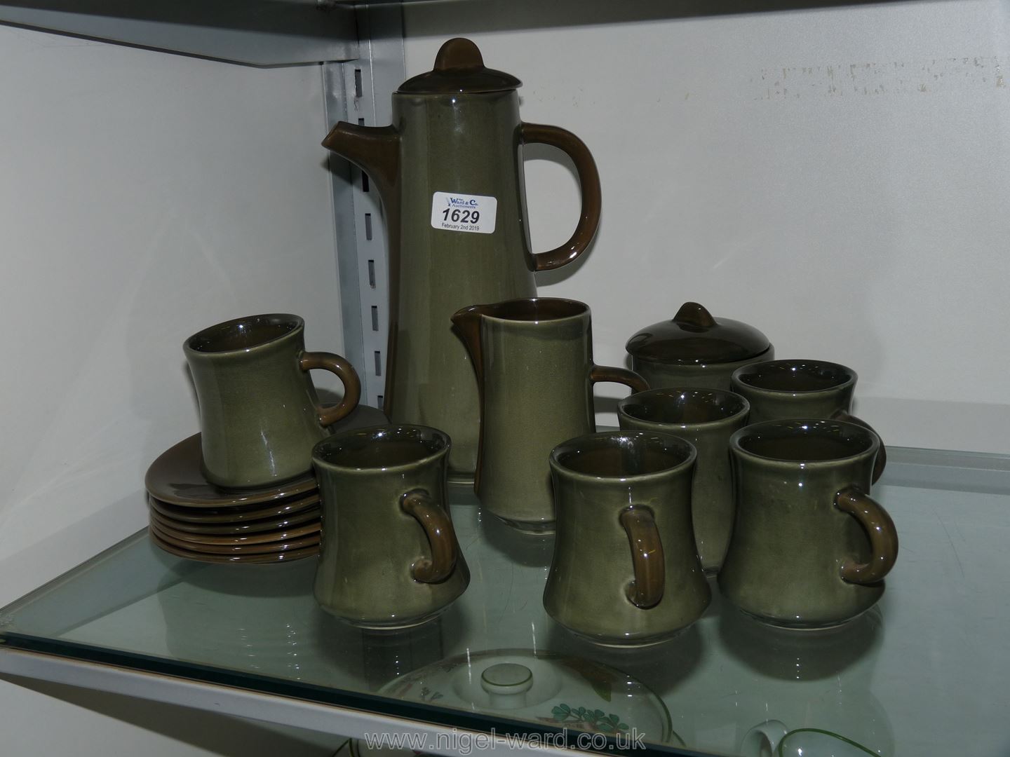 A Cornwall green pottery Coffee set comprising six mugs and saucers, coffee pot with lid,