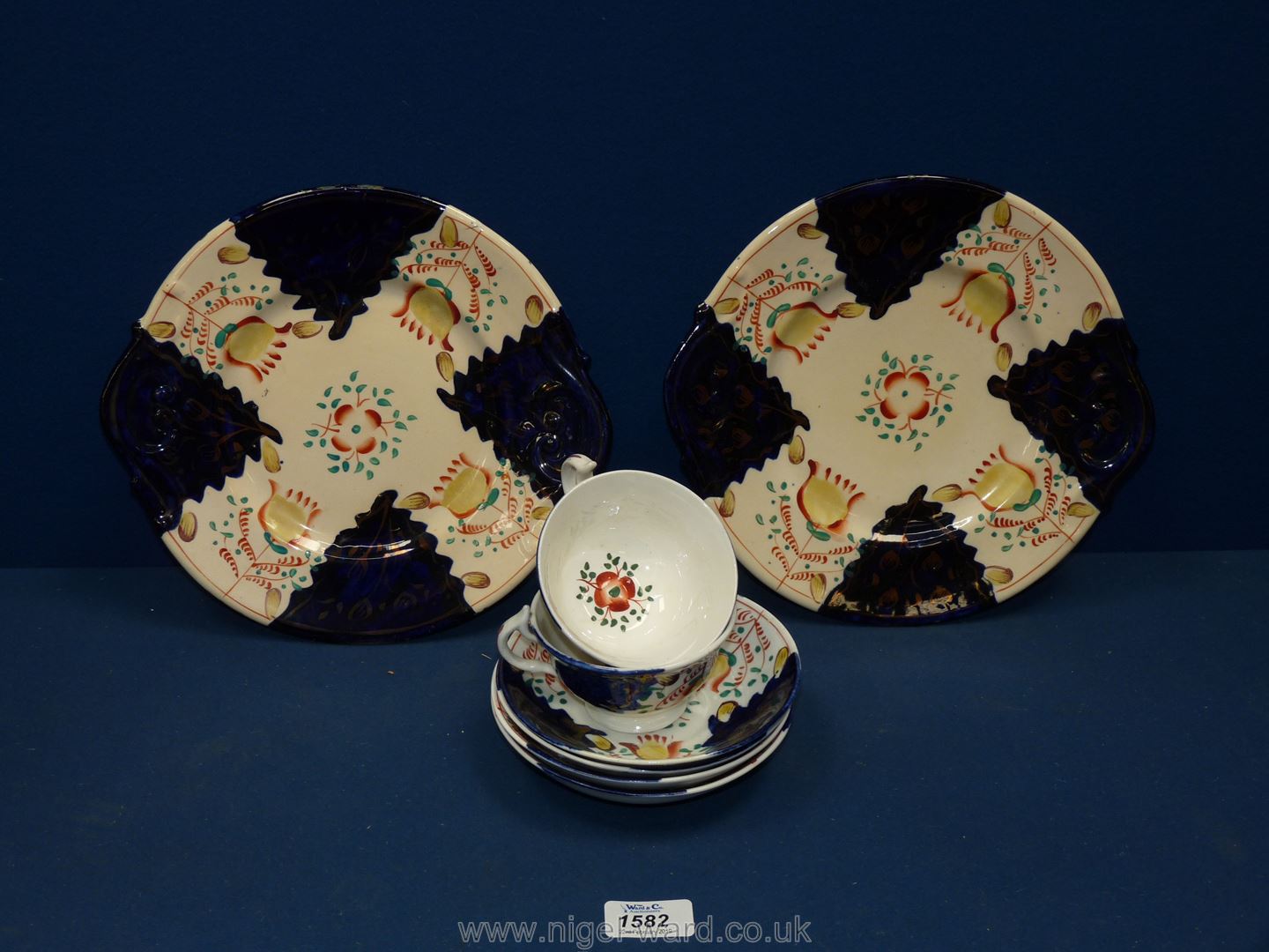 A quantity of Gaudy Welsh china including two medium plates, four saucers and two cups.