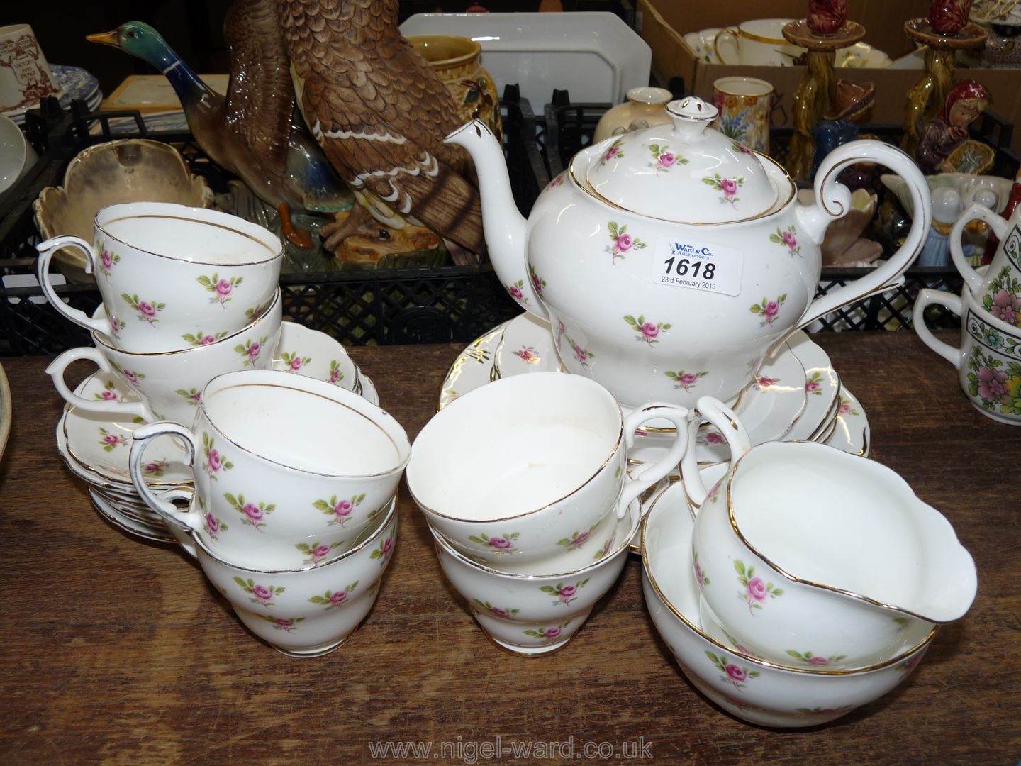 A quantity of vintage Teaware with pink rose pattern, various marks, including six cups, saucers,