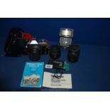 A Praktica MTL3 SLR Camera with 50mm lense, Eveready case, Carl Zeiss Jena 35mm 52.
