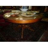 A continental mixed hardwood snap-top circular Dining Table,