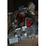 A box of Motor spares including two pairs of rear lights, square clock, fuel,