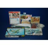 A box of eight vintage plastic model kits by Airfix, Heller etc.