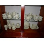 A quantity of Royal Doulton ''Florinda'' tea and coffee ware including mugs, plates, dishes, etc.