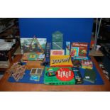 A quantity of games including dominoes, Canasta, playing cards, cribbage board, etc.