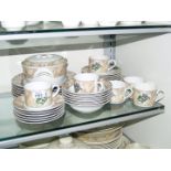 A quantity of Royal Worcester 'Country Garden' pattern dinner/tea service including; dinner plates,