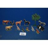 A small quantity of lead animals including cow, tree, chickens, horses, etc.