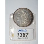 ** An 1881 Silver Dollar.