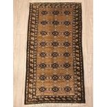 A hand-made Balouch Rug in beige,