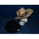 A Stetson Hat and Black Hat