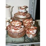 A part Fenton Teaset in brown and pink floral decoration.