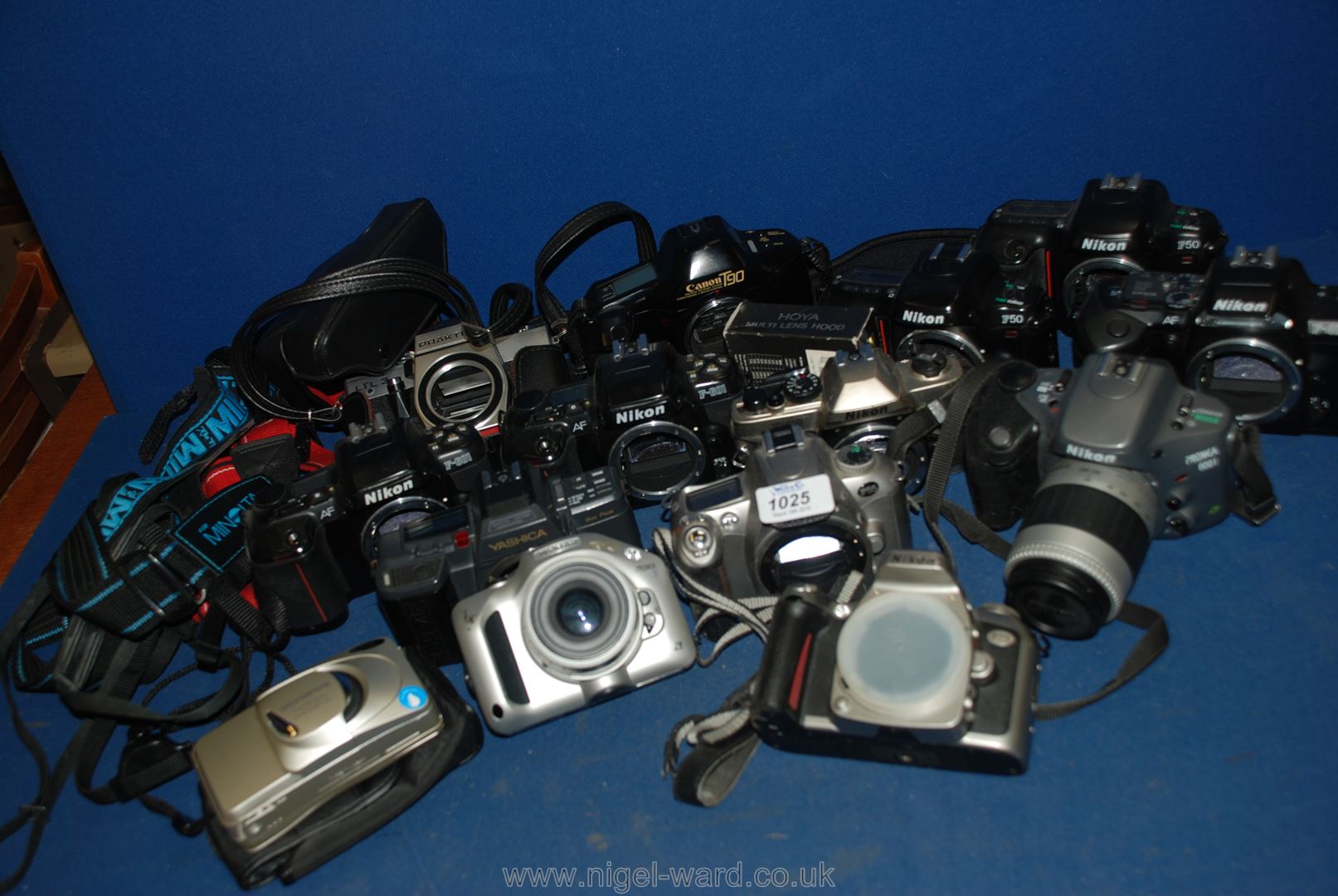 A large quantity of SLR film Cameras to include; Minolta, Nikon, Canon, etc.