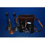 Two metal candlesticks, small hunting horn and a pair of 10 x 50 Binoculars,