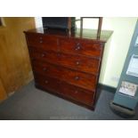 A late Victorian Mahogany Chest of three long and two short drawers standing on a plinth base,