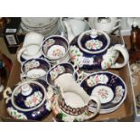 A part Gaudy Welsh Imari pattern tea set including a teapot (spout chipped and a crack on the side),