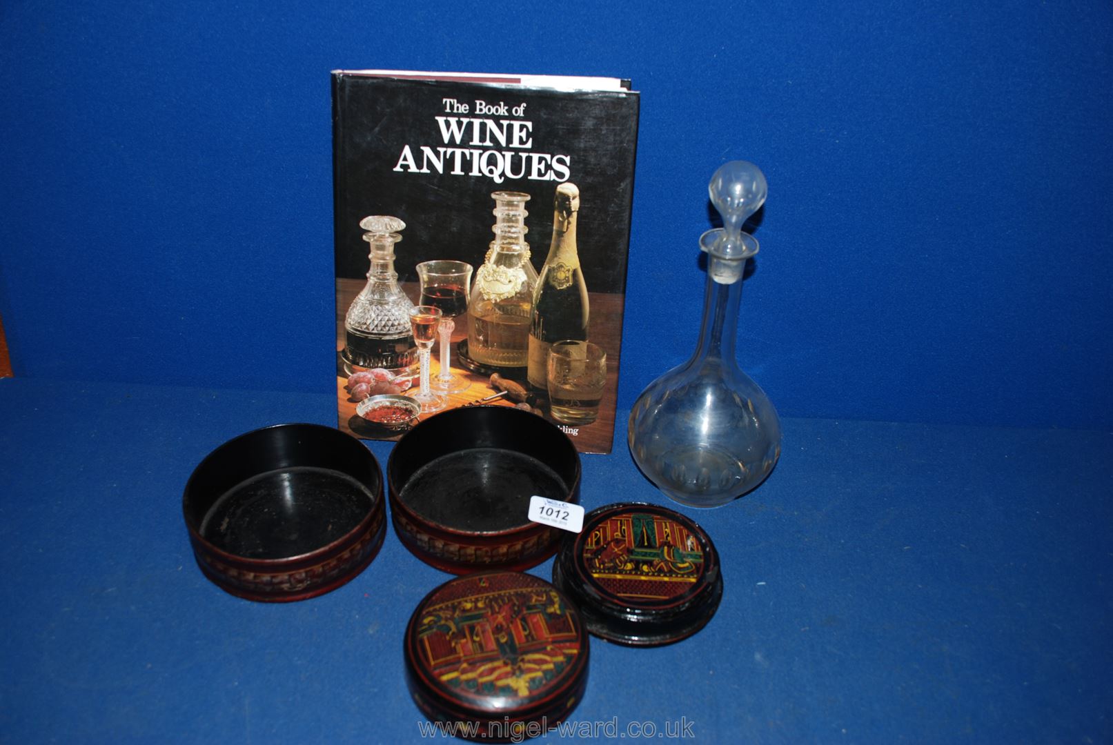 Four wine coasters, an early glass decanter a/f,