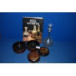 Four wine coasters, an early glass decanter a/f,
