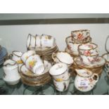 Two old part Teasets decorated with flowers,