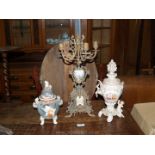 A four branch metal Candlebra having porcelain classical scenes, an oriental three legged,