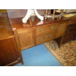 A Mahogany Sideboard of pleasingly square form having a pair of short drawers with pierced back