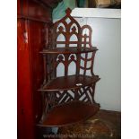 A Mahogany wall hanging three stage corner Shelf unit having fretworked detail/frame,