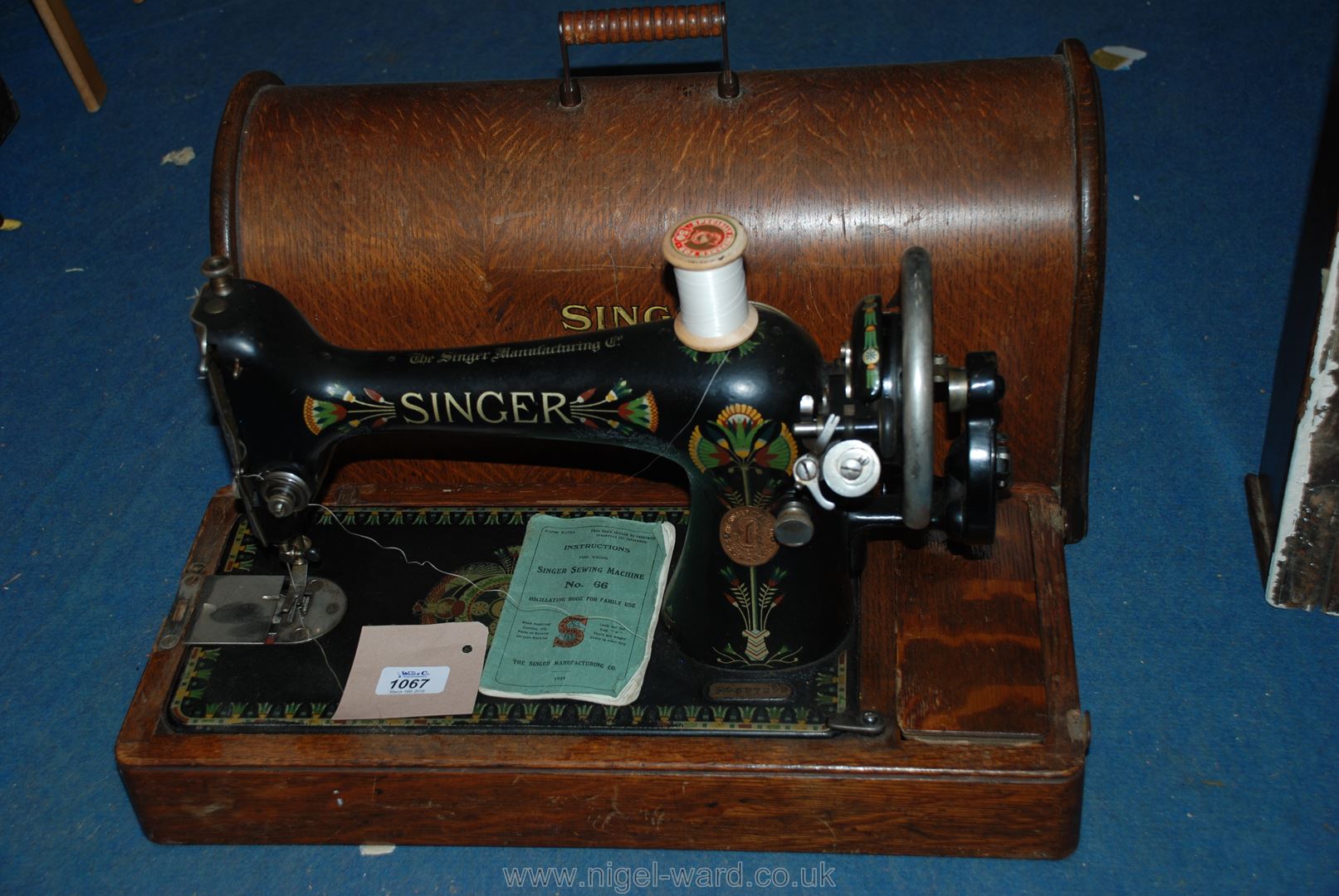 A Singer sewing machine No. 66 (no key).