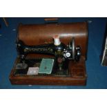 A Singer sewing machine No. 66 (no key).