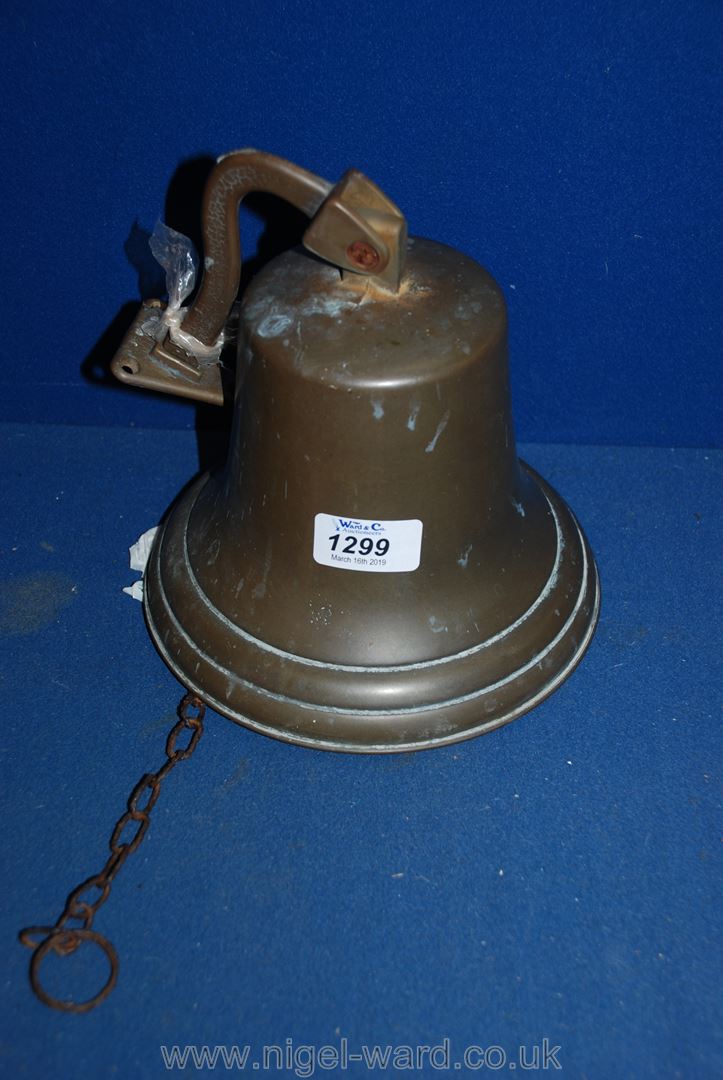 A Brass wall hanging Bell