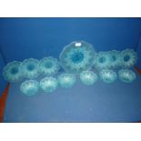 A turquoise glass Dessert set comprising serving plate,