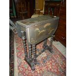 A lacquered Sutherland Table having bobbin turned legs,