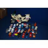 A quantity of cars including an Action Man police bike, a Corgi Ford van,