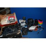 A large quantity of assorted camera equipment to include; lenses, dark room equipment,